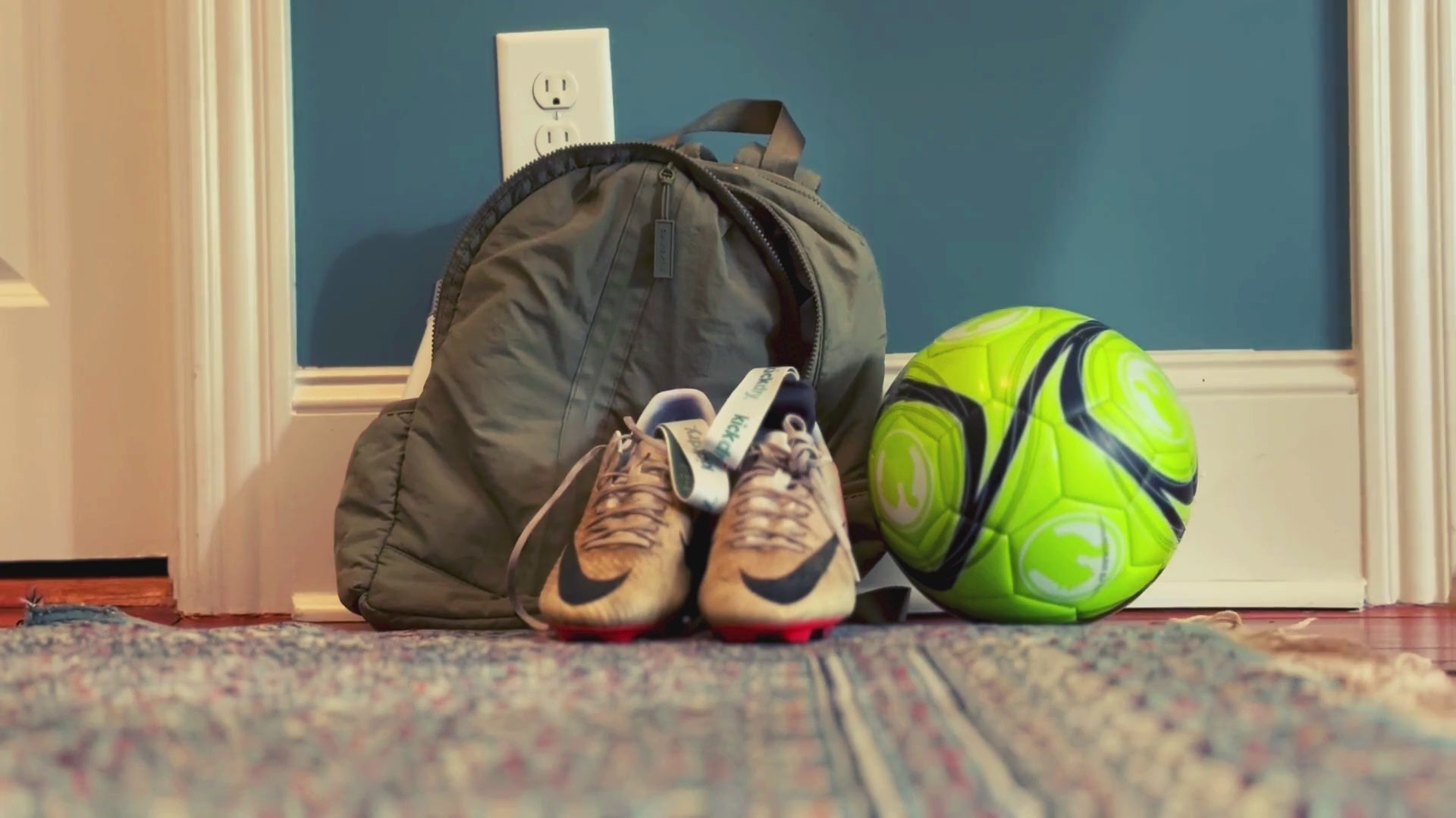 Load video: video that shows a child putting cleats with KickDry into a backpack, a person putting shoes into travel bag, a person removing boots and plaing kickdry inserts into shoes